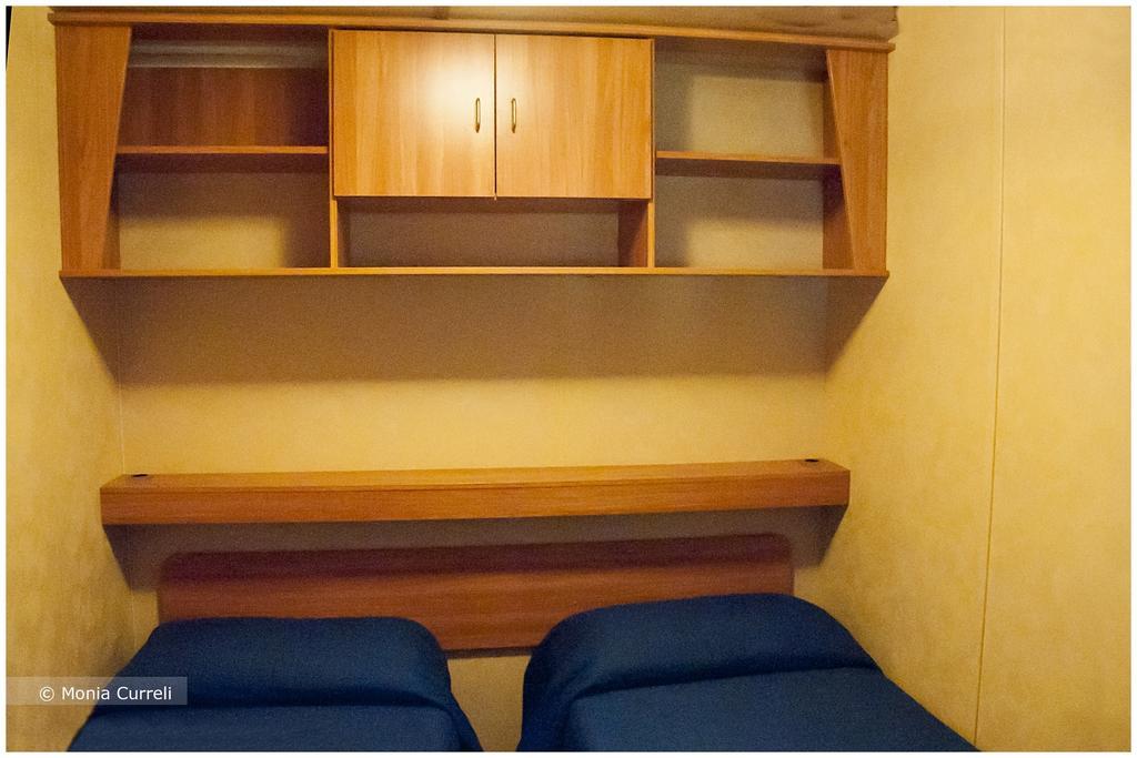 Camping Baia Saraceno Hotel Palau Room photo